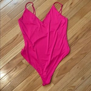 Hot pink bodysuit !
